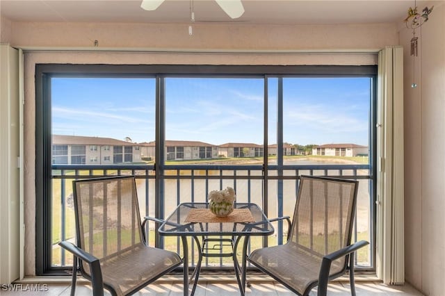 25100 Sandhill Blvd Unit R202, Punta Gorda, FL 33983 - sunroom featuring a residential view and a water view