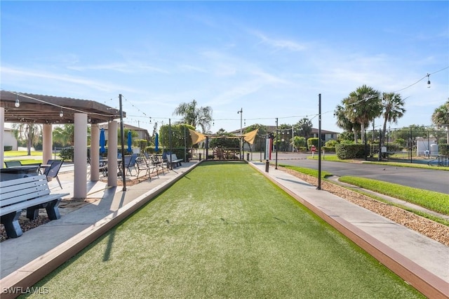 25100 Sandhill Blvd Unit R202, Punta Gorda, FL 33983 - view of community with a bocce ball area and fence