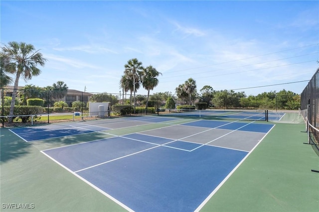 25100 Sandhill Blvd Unit R202, Punta Gorda, FL 33983 - view of tennis court with community basketball court and fence