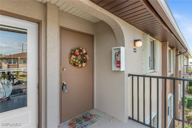 25100 Sandhill Blvd Unit R202, Punta Gorda, FL 33983 - entrance to property featuring stucco siding