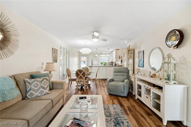 25100 Sandhill Blvd Unit 201, Punta Gorda, FL 33983 - living area featuring dark wood-type flooring and ceiling fan