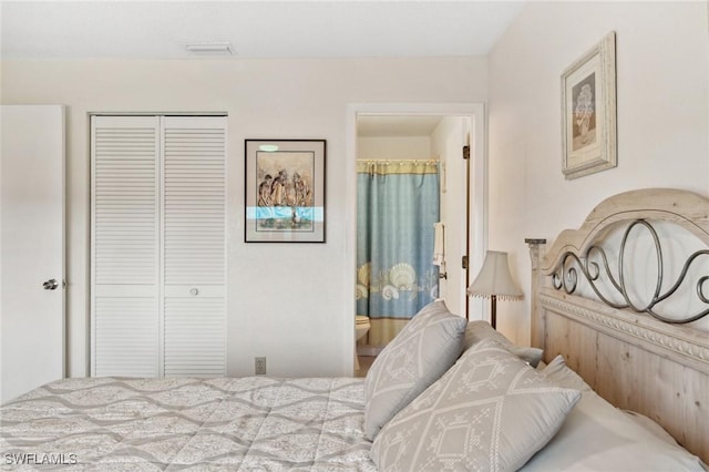 25100 Sandhill Blvd Unit 201, Punta Gorda, FL 33983 - bedroom featuring a closet and ensuite bath