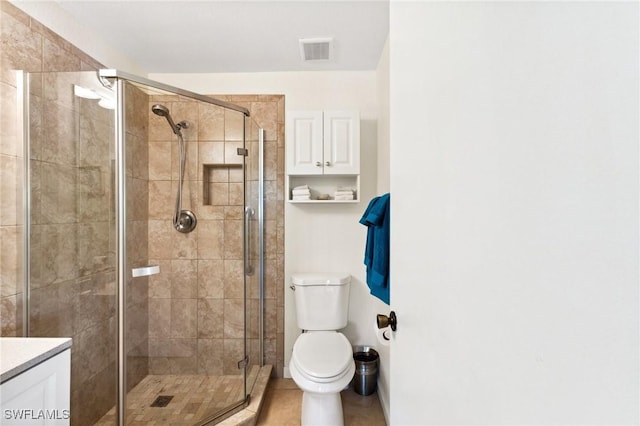 25100 Sandhill Blvd Unit 201, Punta Gorda, FL 33983 - full bath with a stall shower, toilet, vanity, and tile patterned floors