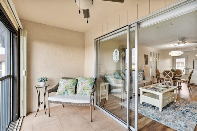 25100 Sandhill Blvd Unit 201, Punta Gorda, FL 33983 - balcony with a ceiling fan