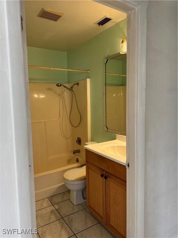 5 Desert Candle Cir, Lehigh Acres, FL 33936 - full bath featuring tile patterned floors, vanity, shower / bathtub combination, and toilet