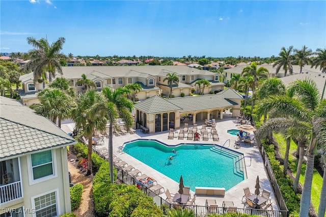 14521 Grande Cay Cir Unit 2902, Fort Myers, FL 33908 - community pool with a residential view, a patio area, and fence