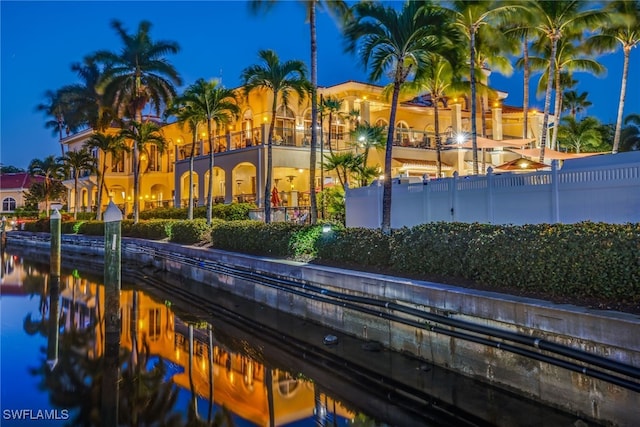 14521 Grande Cay Cir Unit 2902, Fort Myers, FL 33908 - back of house at twilight featuring fence and a water view