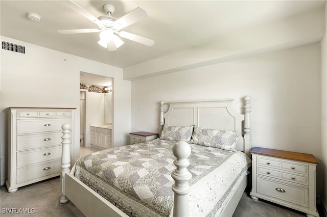 7839 Regal Heron Cir Unit 205, Naples, FL 34104 - bedroom featuring dark carpet, ensuite bathroom, and ceiling fan