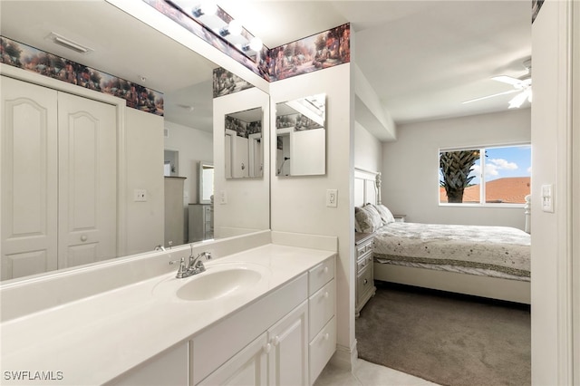 7839 Regal Heron Cir Unit 205, Naples, FL 34104 - bathroom featuring ensuite bathroom, ceiling fan, and vanity