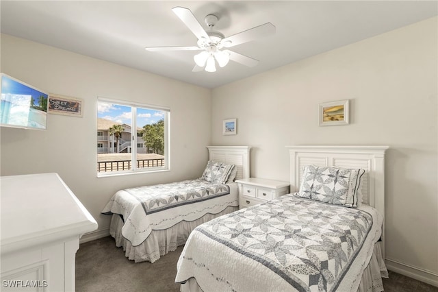 7839 Regal Heron Cir Unit 205, Naples, FL 34104 - bedroom with dark carpet, ceiling fan, and baseboards