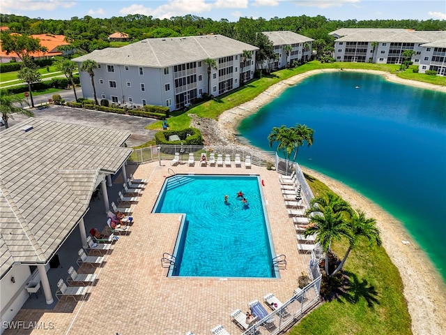7839 Regal Heron Cir Unit 205, Naples, FL 34104 - community pool with a water view and fence