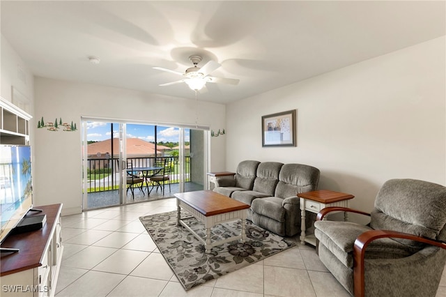 7839 Regal Heron Cir Unit 205, Naples, FL 34104 - living area featuring ceiling fan and light tile patterned flooring