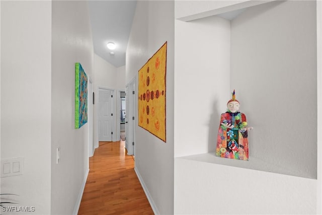 12839 Oakpointe Cir, Fort Myers, FL 33912 - hall featuring wood finished floors and baseboards