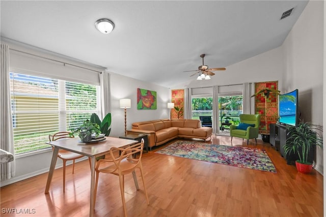 12839 Oakpointe Cir, Fort Myers, FL 33912 - living area featuring ceiling fan, vaulted ceiling, and wood finished floors