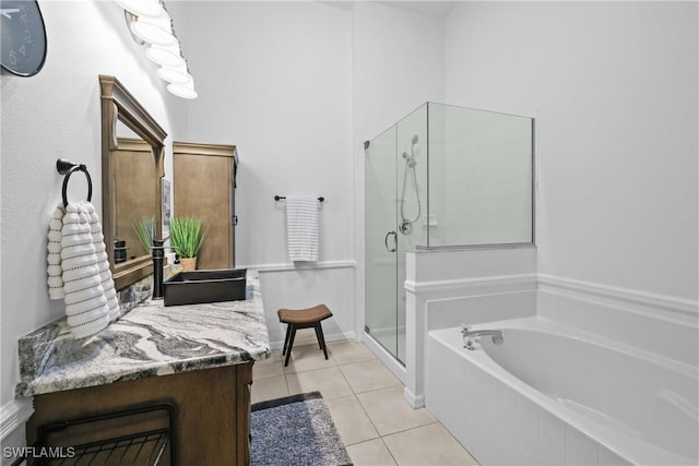 12839 Oakpointe Cir, Fort Myers, FL 33912 - bathroom with a shower stall, vanity, a bath, and tile patterned flooring