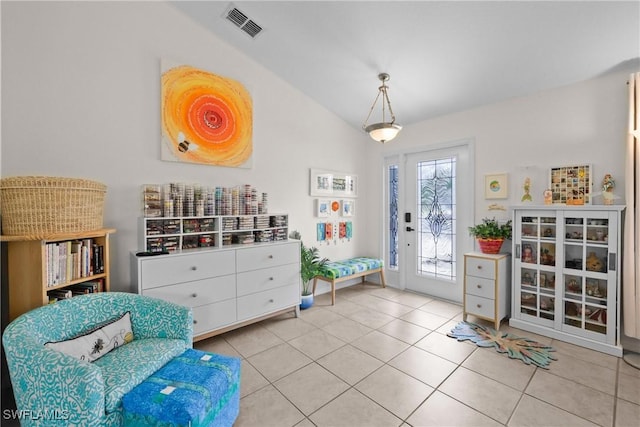12839 Oakpointe Cir, Fort Myers, FL 33912 - sitting room with lofted ceiling and tile patterned flooring
