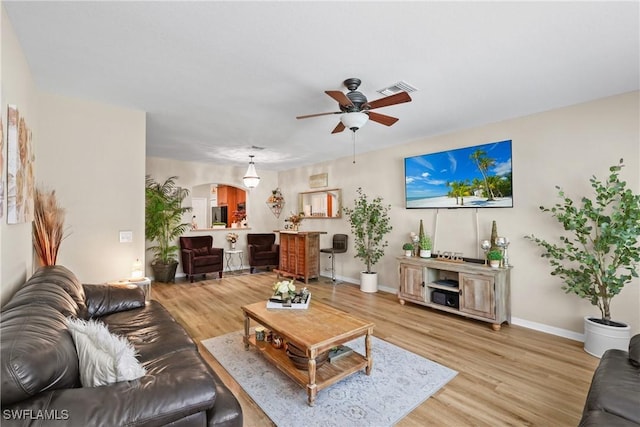 17504 Cherry Ridge Ln, Fort Myers, FL 33967 - living area with ceiling fan, light wood finished floors, and baseboards