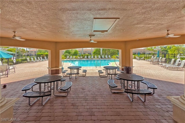 17504 Cherry Ridge Ln, Fort Myers, FL 33967 - view of patio with a ceiling fan and a community pool