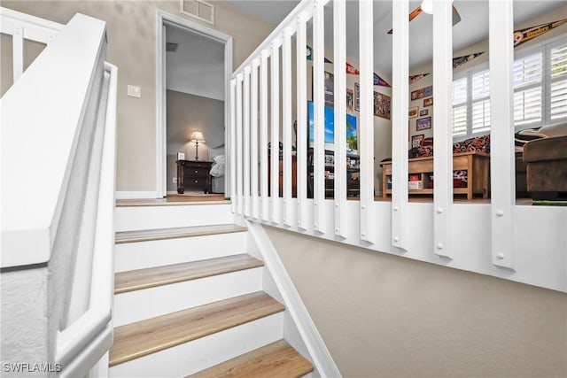 17504 Cherry Ridge Ln, Fort Myers, FL 33967 - staircase with ceiling fan