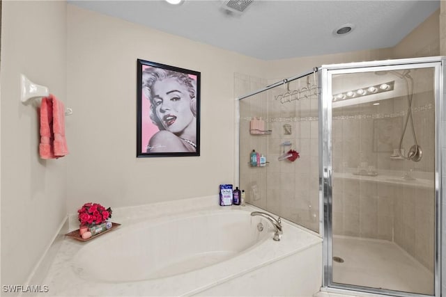 17504 Cherry Ridge Ln, Fort Myers, FL 33967 - bathroom featuring a garden tub and a shower stall
