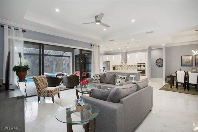 610 25th Ave NW, Naples, FL 34120 - living area featuring a tray ceiling, light marble finish flooring, ceiling fan, crown molding, and recessed lighting