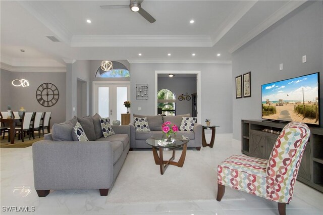 610 25th Ave NW, Naples, FL 34120 - living area featuring a tray ceiling, a ceiling fan, crown molding, recessed lighting, and french doors
