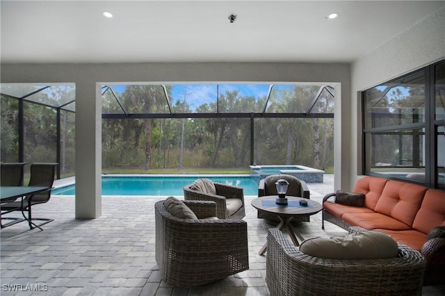 610 25th Ave NW, Naples, FL 34120 - outdoor pool with an in-ground hot tub, a patio area, a lanai, and outdoor lounge area