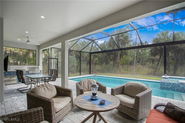610 25th Ave NW, Naples, FL 34120 - view of pool featuring a lanai, a patio, ceiling fan, and a pool with connected hot tub