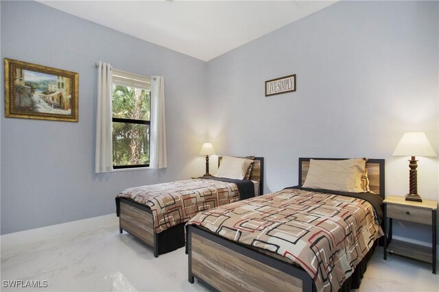 610 25th Ave NW, Naples, FL 34120 - bedroom with baseboards