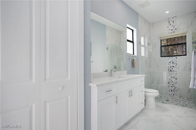 610 25th Ave NW, Naples, FL 34120 - bathroom featuring a marble finish shower, toilet, marble tiled floors, vanity, and recessed lighting