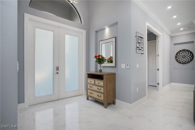 610 25th Ave NW, Naples, FL 34120 - entrance foyer with french doors, ornamental molding, baseboards, light marble finish floors, and recessed lighting