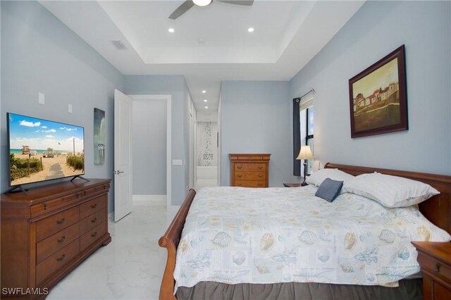 610 25th Ave NW, Naples, FL 34120 - bedroom featuring recessed lighting, a raised ceiling, ceiling fan, and ensuite bath