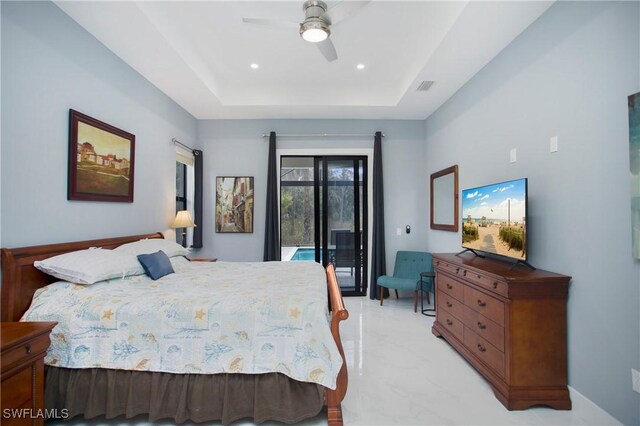 610 25th Ave NW, Naples, FL 34120 - bedroom with access to exterior, a tray ceiling, ceiling fan, and recessed lighting