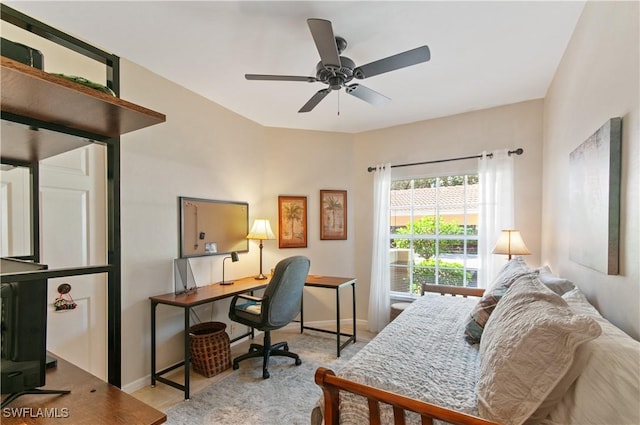 13020 Amberley Ct Unit 301, Bonita Springs, FL 34135 - bedroom with a desk, ceiling fan, and carpet flooring