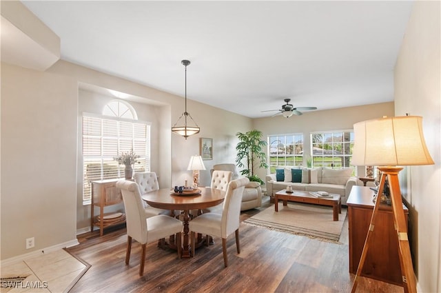 13020 Amberley Ct Unit 301, Bonita Springs, FL 34135 - dining area featuring wood finished floors and ceiling fan
