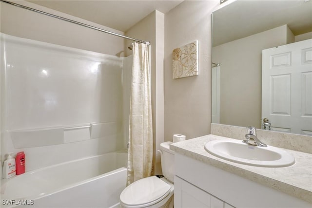 bathroom with toilet, vanity, and shower / bath combo with shower curtain
