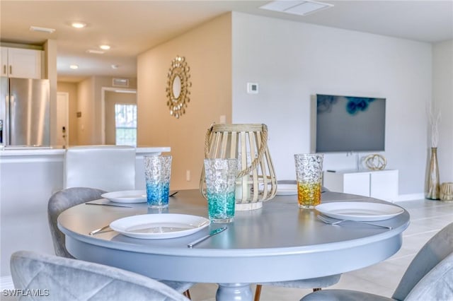 dining room featuring recessed lighting
