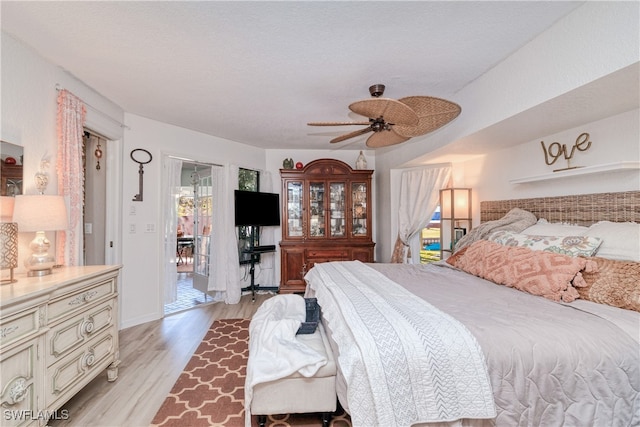 28427 Sabal Palm Dr, Punta Gorda, FL 33982 - bedroom featuring light wood finished floors and ceiling fan