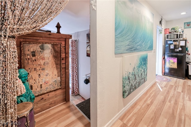28427 Sabal Palm Dr, Punta Gorda, FL 33982 - hall featuring wood finished floors and recessed lighting
