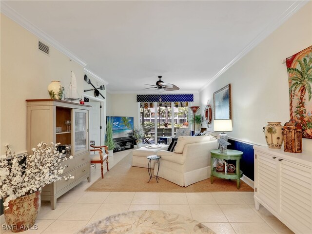 2110 Cay Lagoon Dr Unit 113, Naples, FL 34109 - living room with crown molding, ceiling fan, and light tile patterned floors