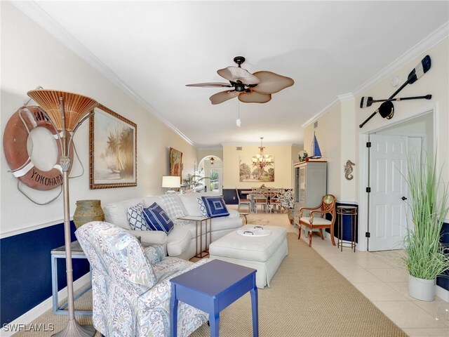 2110 Cay Lagoon Dr Unit 113, Naples, FL 34109 - living room with crown molding, a ceiling fan, a chandelier, and light tile patterned floors