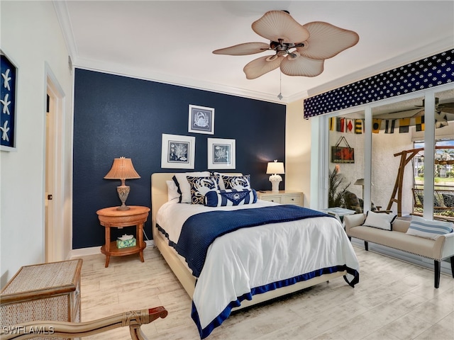 2110 Cay Lagoon Dr Unit 113, Naples, FL 34109 - bedroom featuring crown molding, wood finished floors, baseboards, and a ceiling fan