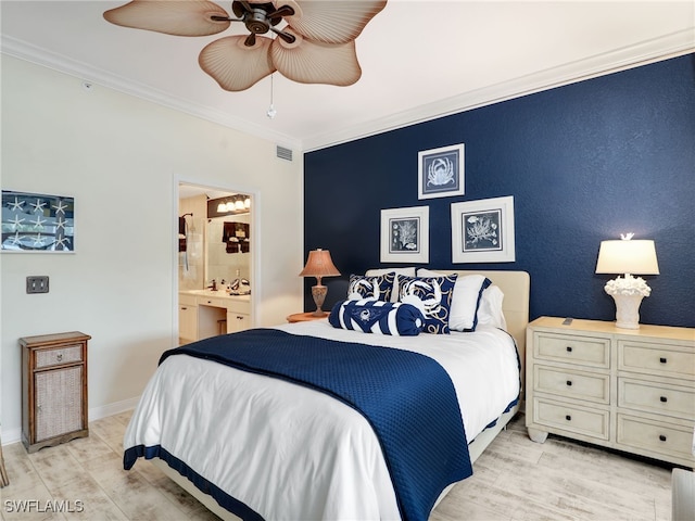 2110 Cay Lagoon Dr Unit 113, Naples, FL 34109 - bedroom featuring ornamental molding, ensuite bath, a ceiling fan, and light wood-style flooring