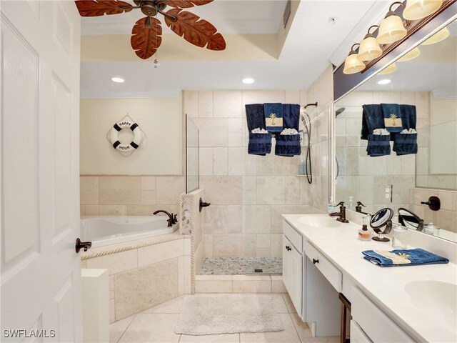2110 Cay Lagoon Dr Unit 113, Naples, FL 34109 - bathroom with tile patterned floors, double vanity, a walk in shower, a garden tub, and recessed lighting