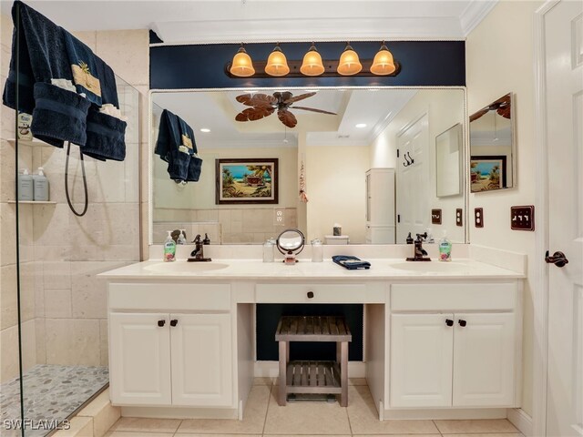 2110 Cay Lagoon Dr Unit 113, Naples, FL 34109 - full bath with crown molding, ceiling fan, double vanity, walk in shower, and tile patterned floors