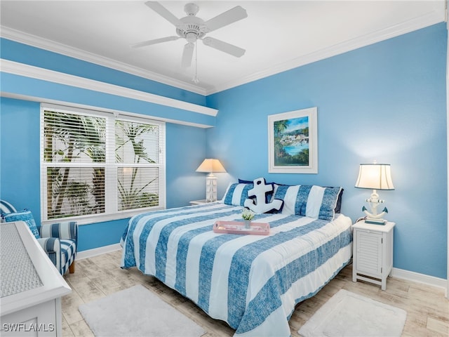 2110 Cay Lagoon Dr Unit 113, Naples, FL 34109 - bedroom featuring baseboards, crown molding, wood finished floors, and a ceiling fan