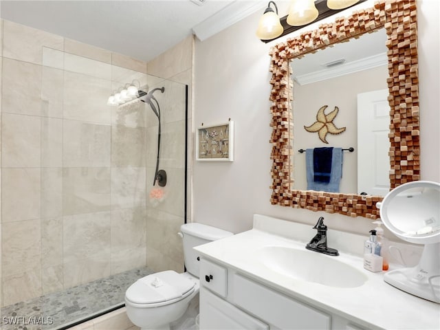 2110 Cay Lagoon Dr Unit 113, Naples, FL 34109 - bathroom with crown molding, a tile shower, vanity, and toilet
