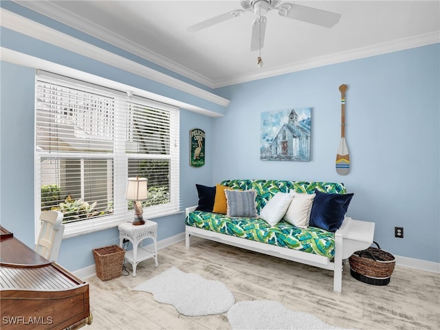 2110 Cay Lagoon Dr Unit 113, Naples, FL 34109 - living area with crown molding, wood finished floors, baseboards, and a ceiling fan