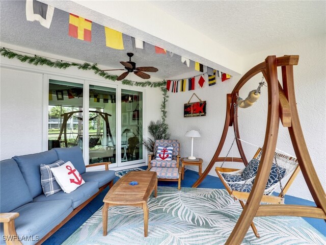 2110 Cay Lagoon Dr Unit 113, Naples, FL 34109 - view of patio with a ceiling fan and an outdoor living space