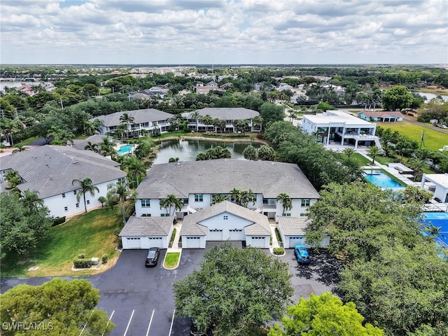 2110 Cay Lagoon Dr Unit 113, Naples, FL 34109 - bird's eye view of a pool and a large body of water